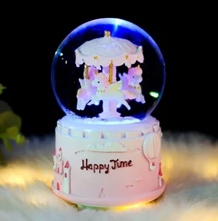 گوی موزیکال برفی پمپی و چراغدار طرح چرخ فلک یونیکورن مدل Happy Time